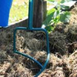 What is a compost aerator used for?