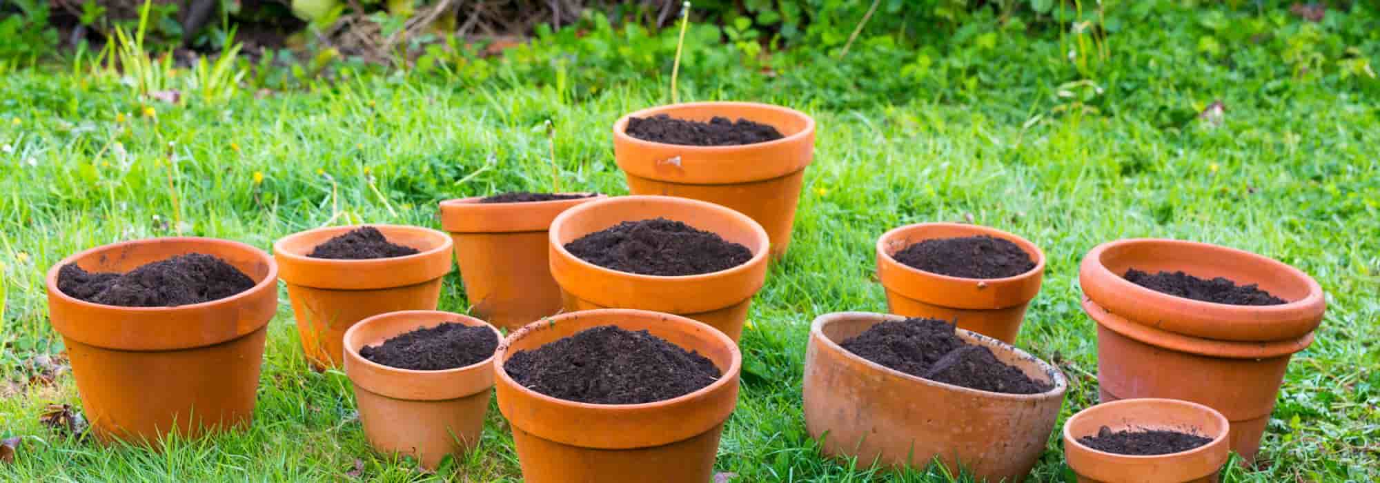 What should I do with the soil and potting compost from old flower pots?